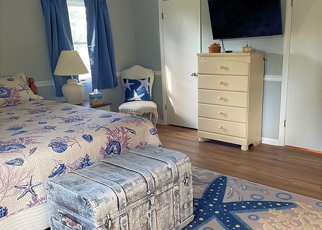 bedroom featuring hardwood / wood-style floors