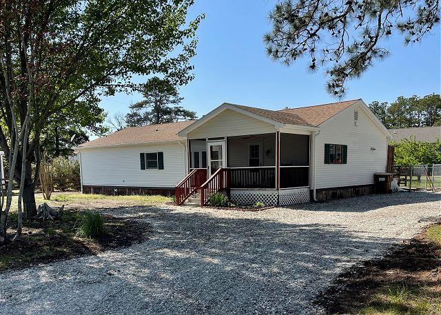 3143 Ridge Rd, Chincoteague, VA 23336 - view of front facade with a sunroom