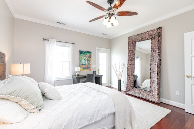 bedroom featuring ceiling fan, dark wood-type flooring, and ornamental molding