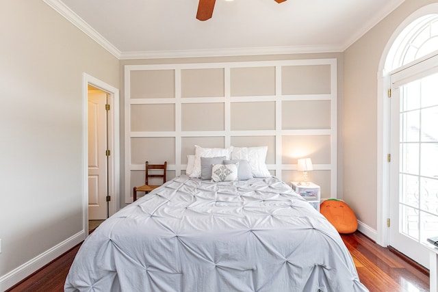 bedroom featuring multiple windows, ceiling fan, and dark wood-type flooring