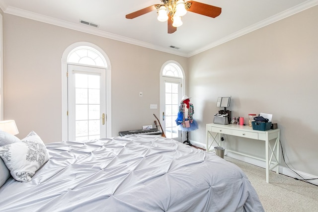 bedroom featuring light colored carpet, ceiling fan, and ornamental molding