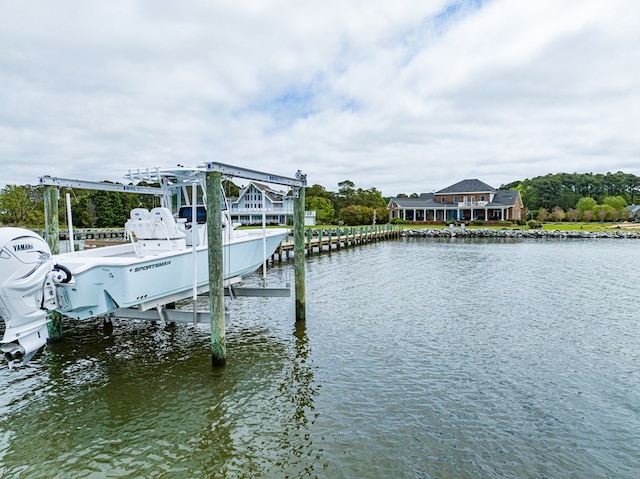 dock area with a water view