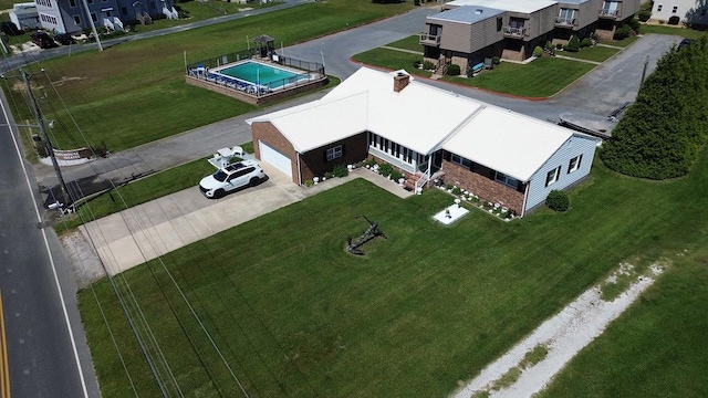 7669 E Side Rd, Chincoteague, VA 23336 - aerial perspective of suburban area with a pool area