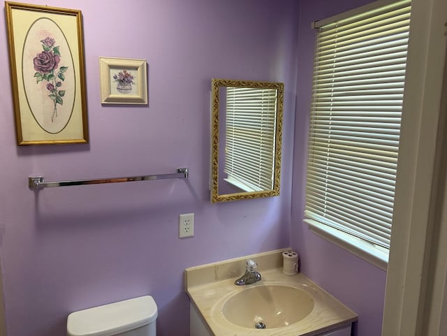 7669 E Side Rd, Chincoteague, VA 23336 - half bathroom featuring toilet and vanity