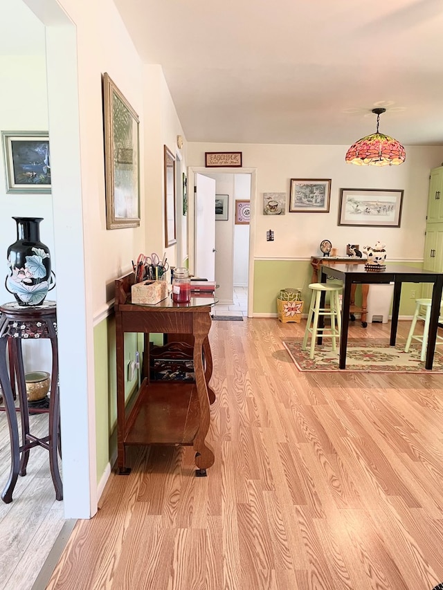 7669 E Side Rd, Chincoteague, VA 23336 - hall featuring light wood-style flooring and baseboards