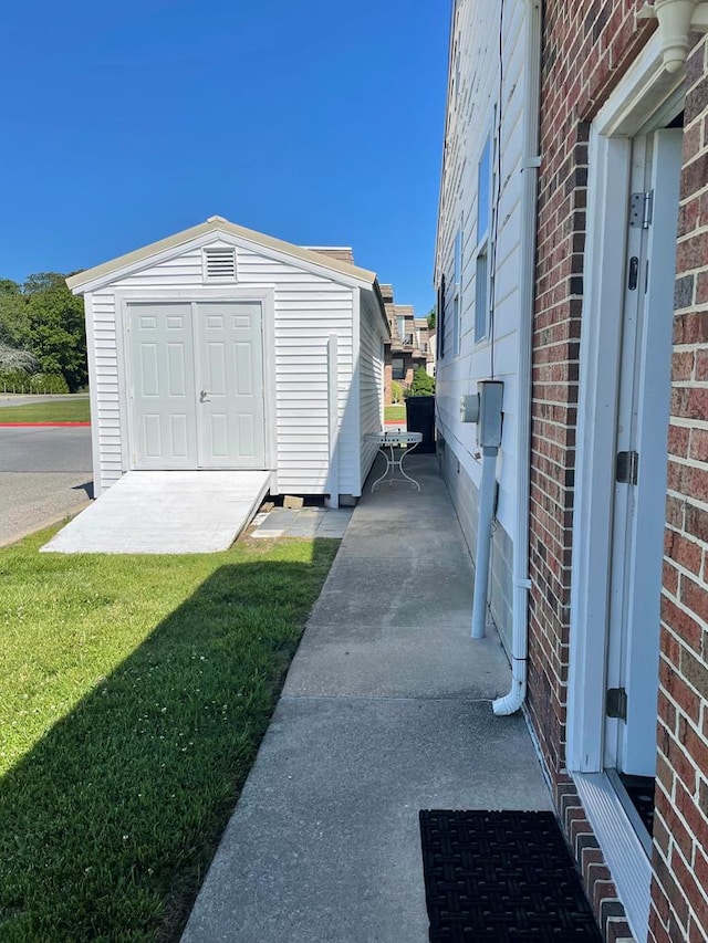 7669 E Side Rd, Chincoteague, VA 23336 - garage with a storage shed