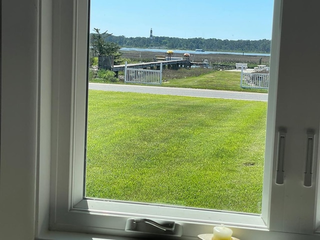 7669 E Side Rd, Chincoteague, VA 23336 - view of grassy yard with a water view