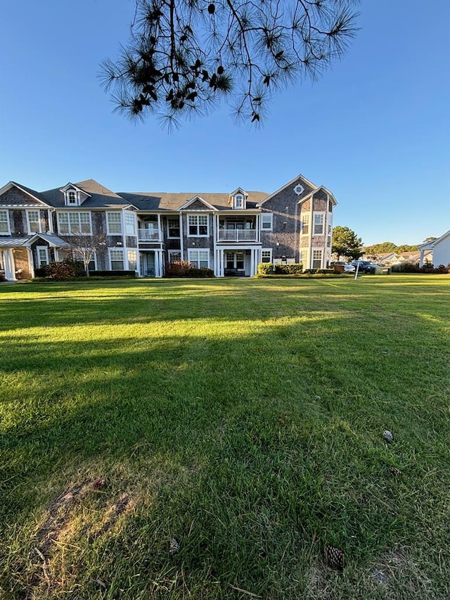 exterior space with a yard