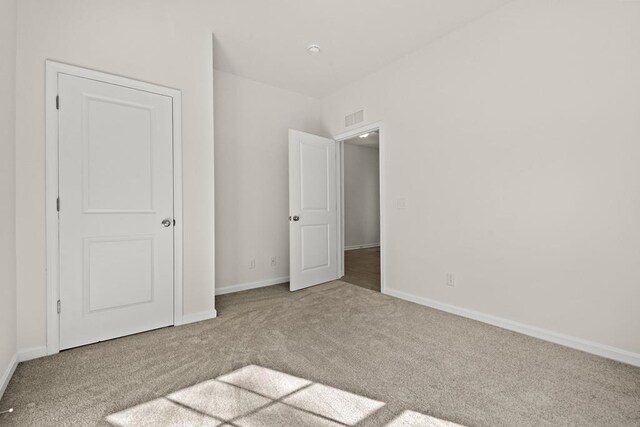 LOT476 Driftwood Dr, Greenbackville, VA 23356 - unfurnished bedroom with carpet floors and baseboards