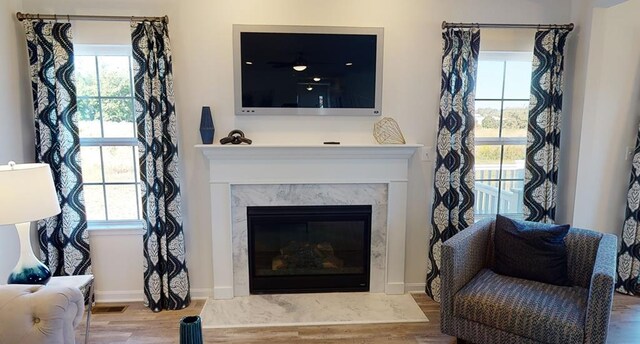 LOT476 Driftwood Dr, Greenbackville, VA 23356 - living area featuring plenty of natural light and wood finished floors