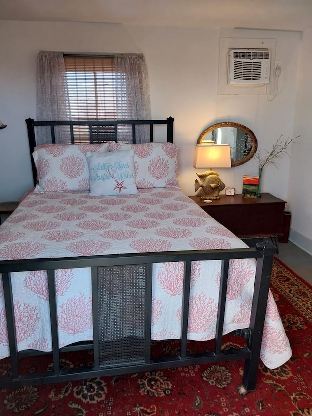 bedroom with a wall unit AC