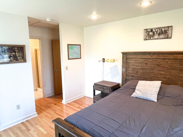 bedroom featuring light wood-type flooring