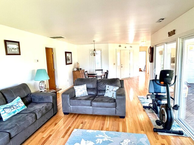 living room with light hardwood / wood-style floors