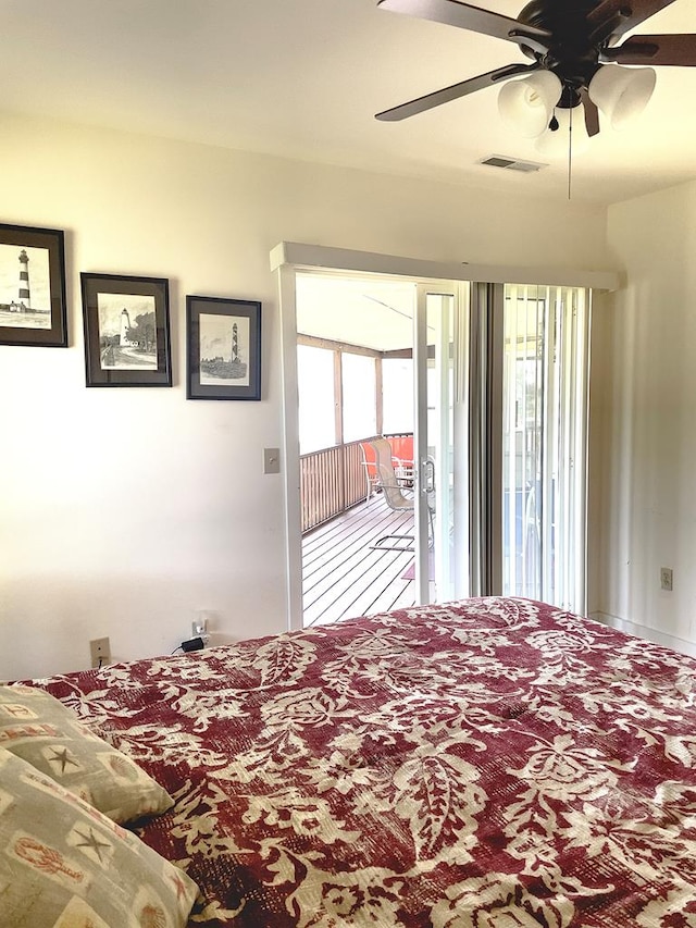 bedroom featuring ceiling fan and access to exterior