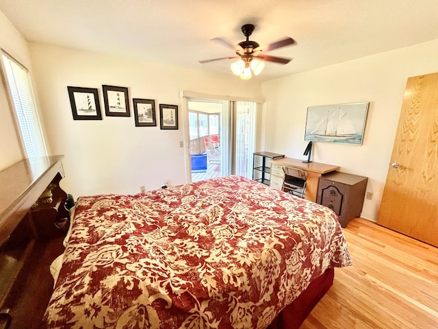 bedroom with ceiling fan and light hardwood / wood-style floors