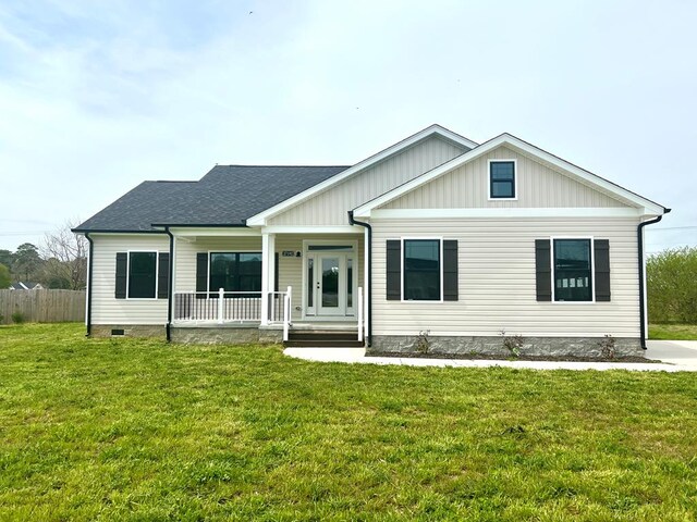 27192 Castle Row, Cape Charles, VA 23310 - view of front facade featuring a porch, roof with shingles, and crawl space