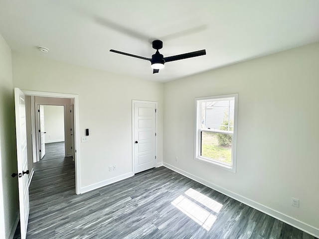 27192 Castle Row, Cape Charles, VA 23310 - unfurnished bedroom featuring dark wood-type flooring and ceiling fan