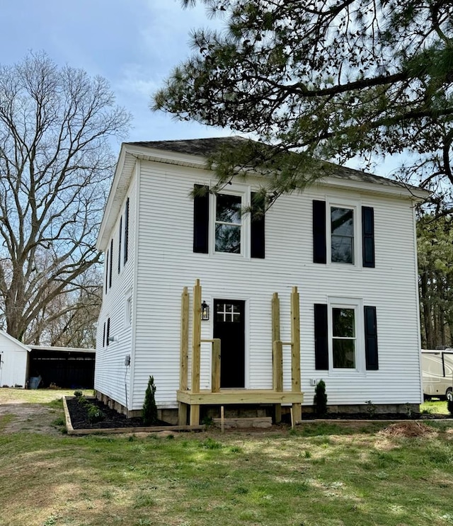 view of front of home with a front yard