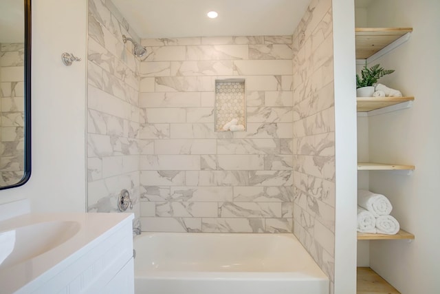 full bathroom featuring washtub / shower combination, vanity, and recessed lighting