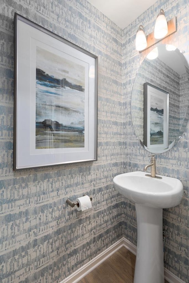 547 Skipper Ct, Greenbackville, VA 23356 - bathroom featuring wood finished floors and wallpapered walls