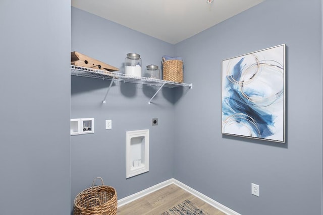 laundry room with hardwood / wood-style floors, electric dryer hookup, and hookup for a washing machine