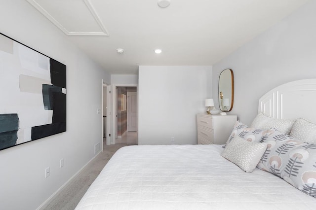 bedroom with light colored carpet