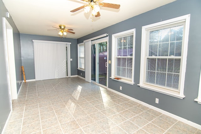 empty room featuring ceiling fan