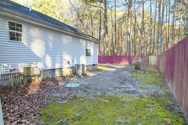 view of yard featuring central AC