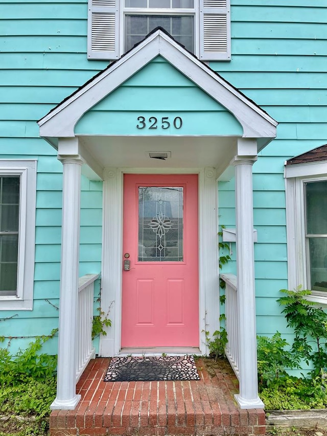3250 Colona St, Chincoteague, VA 23336 - entrance to property featuring a porch