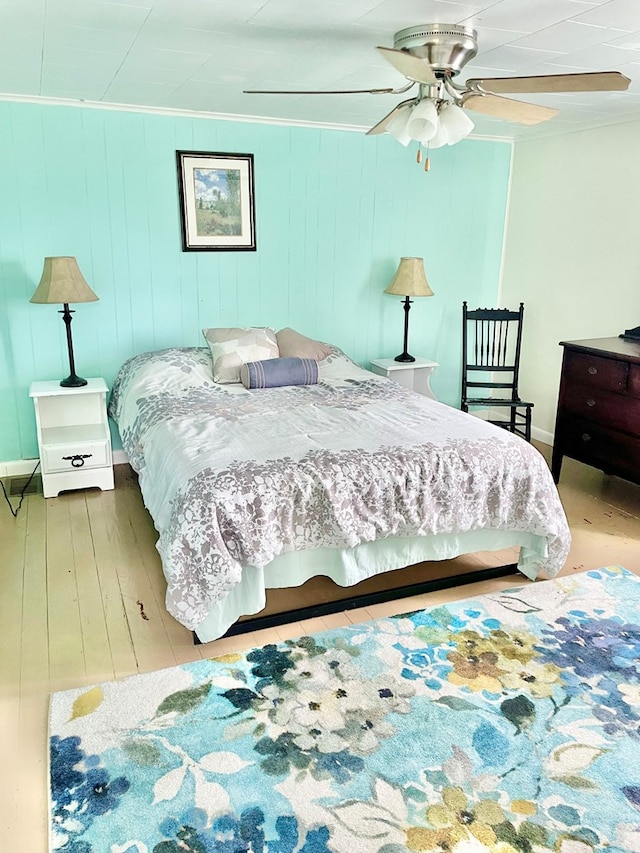 3250 Colona St, Chincoteague, VA 23336 - bedroom featuring wood-type flooring, a ceiling fan, and crown molding