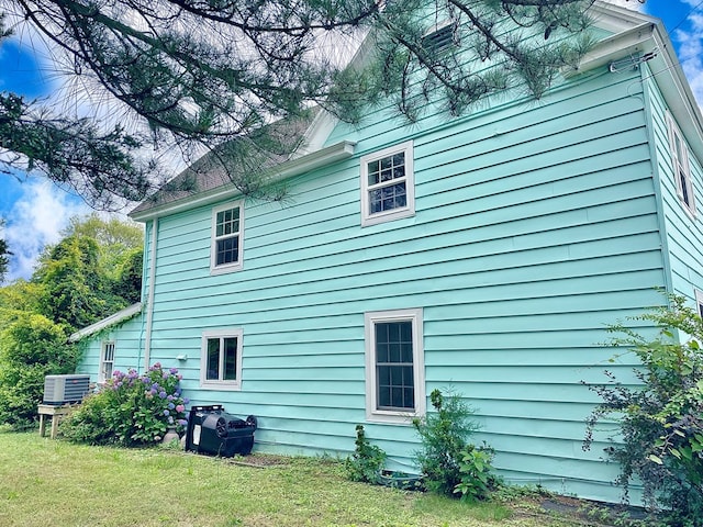3250 Colona St, Chincoteague, VA 23336 - view of home's exterior featuring a yard and a cooling unit