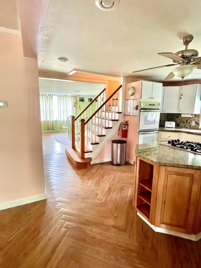 3250 Colona St, Chincoteague, VA 23336 - kitchen featuring baseboards, white appliances, a ceiling fan, light stone counters, and open shelves