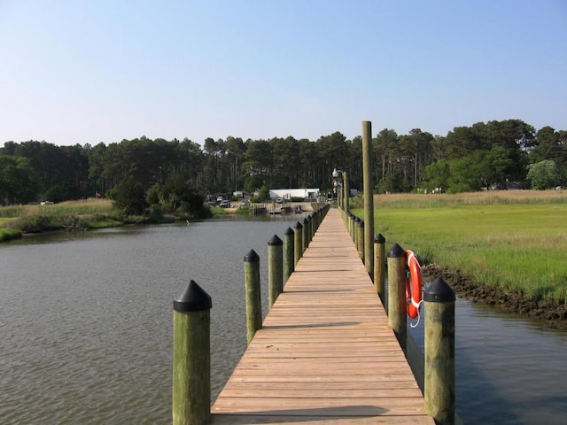 view of dock with a water view