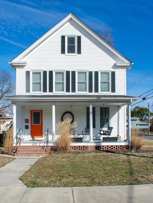 653A Monroe Ave, Cape Charles, VA 23310 - front facade featuring a front yard and a porch