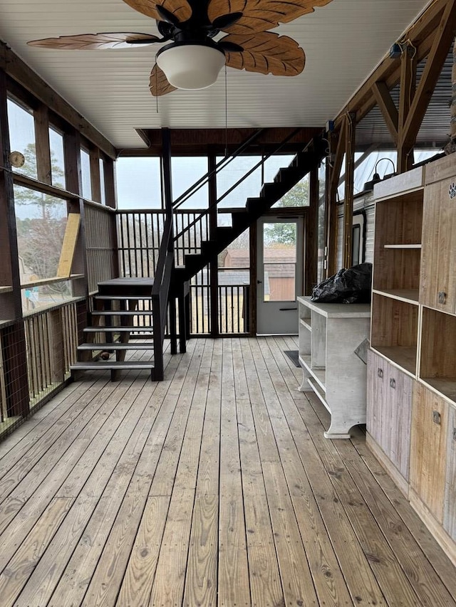 deck with stairway and ceiling fan