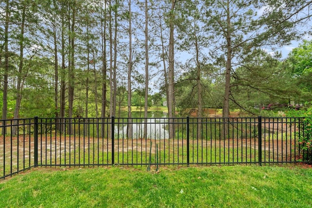 8 Perny Ct, Cape Charles, VA 23310 - view of yard with a water view and fence