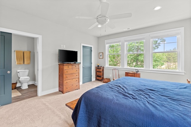 8 Perny Ct, Cape Charles, VA 23310 - carpeted bedroom featuring ensuite bath, visible vents, recessed lighting, ceiling fan, and baseboards