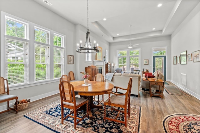 8 Perny Ct, Cape Charles, VA 23310 - dining space with a wealth of natural light, wood finished floors, and baseboards