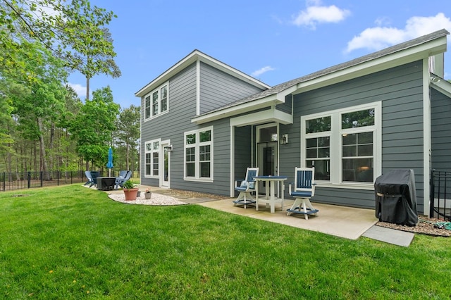 8 Perny Ct, Cape Charles, VA 23310 - rear view of property featuring a patio area, fence, and a lawn