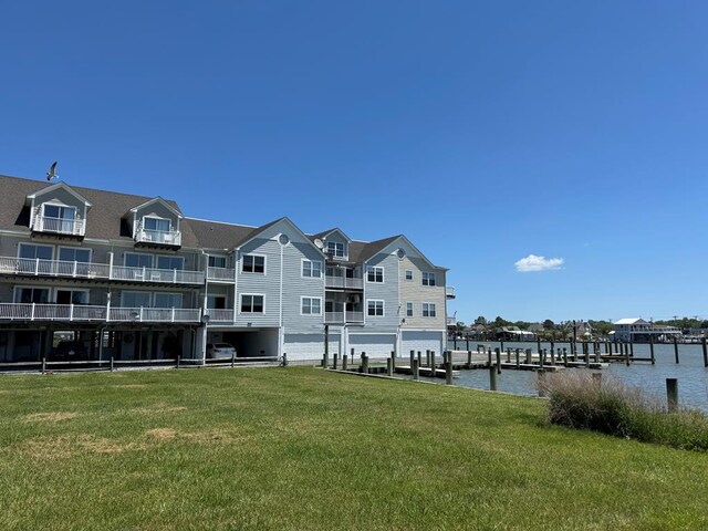 6159 Marsh Island Dr, Chincoteague, VA 23336 - view of building exterior with a water view