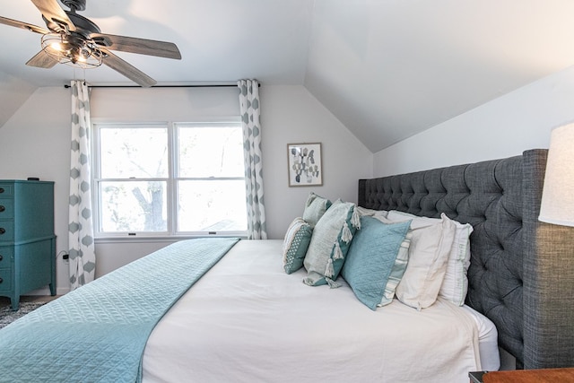 bedroom with ceiling fan and vaulted ceiling