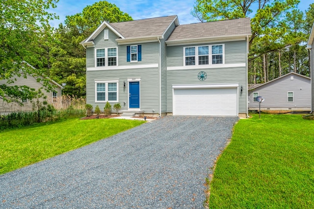 view of front of property with a garage and a front lawn