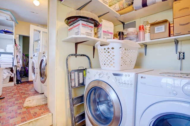 laundry room featuring separate washer and dryer