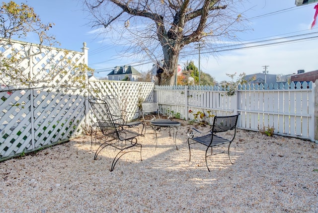 view of patio / terrace with an outdoor fire pit