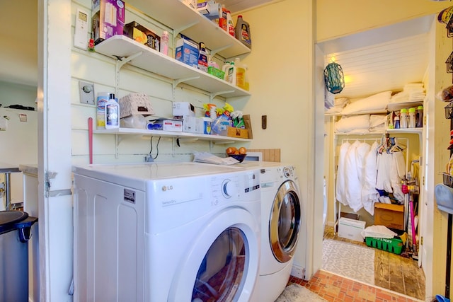 washroom with washer and clothes dryer