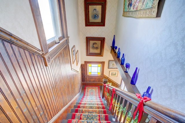 staircase with plenty of natural light