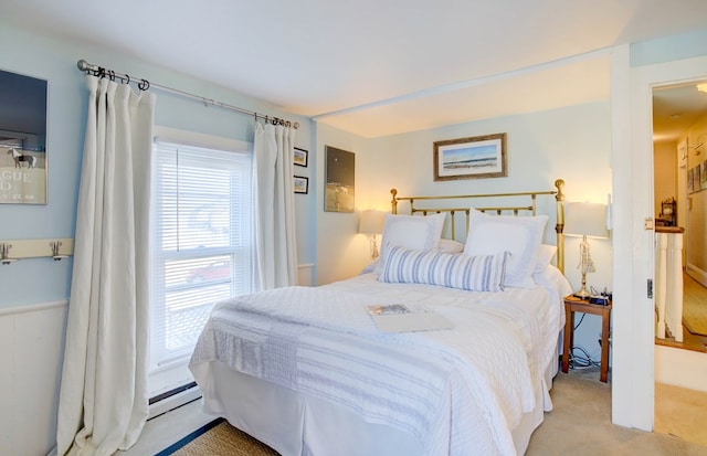 bedroom with light colored carpet