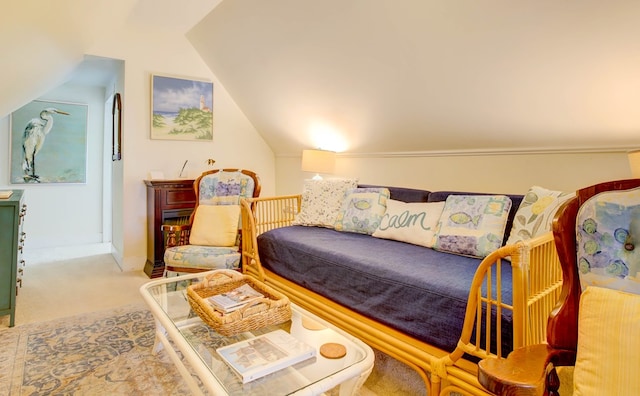 carpeted bedroom featuring lofted ceiling