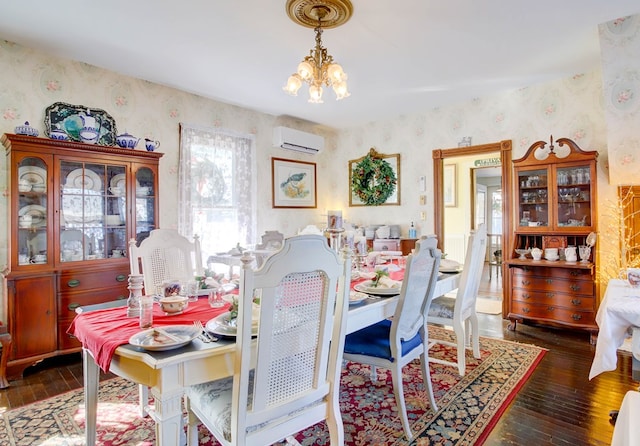 dining area featuring a notable chandelier, dark wood-type flooring, and a wall mounted AC