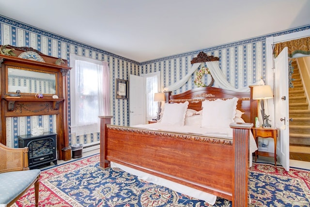 bedroom with a wood stove